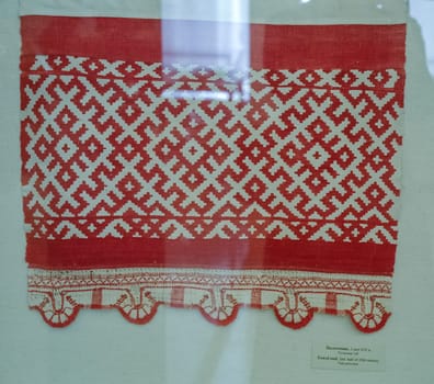 a Scarves and towels and scarves with folk Russian ornament.