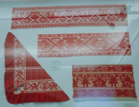 a Scarves and towels and scarves with folk Russian ornament.