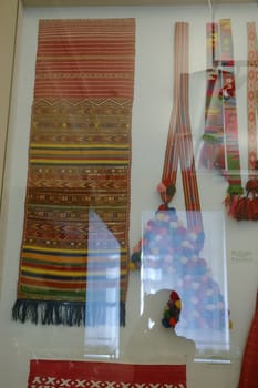 a Scarves and towels and scarves with folk Russian ornament.