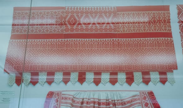 a Scarves and towels and scarves with folk Russian ornament.