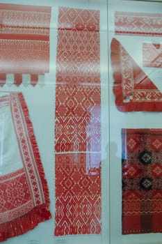 a Scarves and towels and scarves with folk Russian ornament.