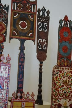 Wood carvings, spinning with folk Russian ornaments.