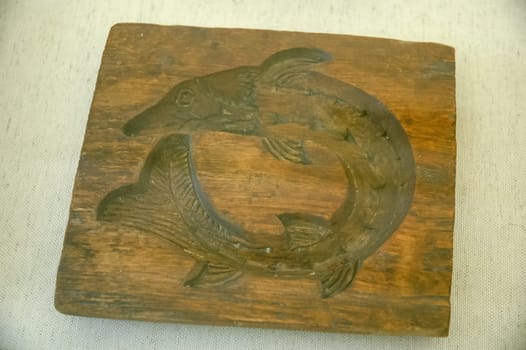 wooden shape in the shape of a pike. Form for pouring.