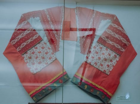 a Scarves and towels and scarves with folk Russian ornament.