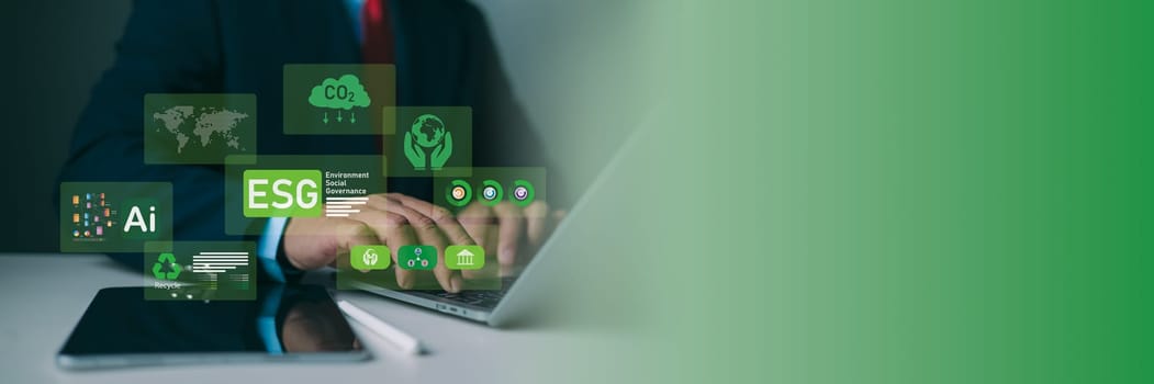 ESG environmental social governance investment business concept, Man hand using laptop to analyze ESG on screen in business investment strategy concept, Environmental and business growth together.