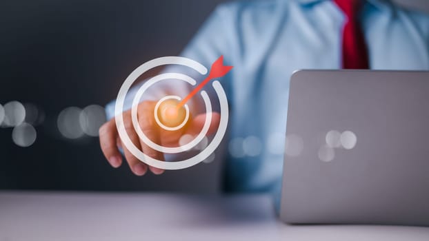 Targeting business concept, Strategic planning for business growth and target customer group, set up business objective target goal, Businessman point virtual target icons for business objective.