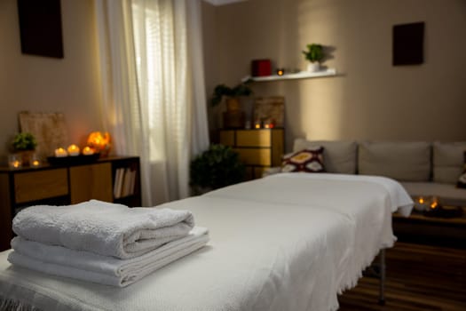 A calming spa environment designed with a massage table and serene decor, ensuring ultimate relaxation and peace