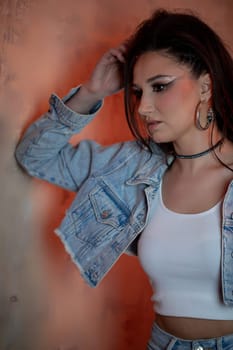 A stylish young woman captures the latest fashion trends, showcasing vibrant hues and chic trendy accessories