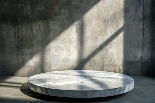 A large white marble table sits in a room with a large window. The table is round and has a shiny surface. The room is empty and the table is the only piece of furniture