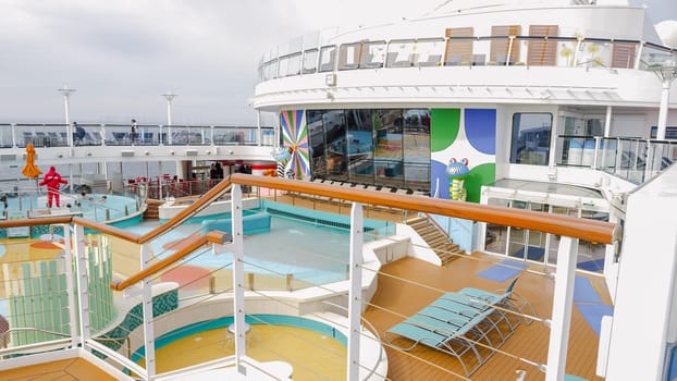 Exciting and Colorful Waterslide on a Cruise Ship with Stunning Ocean Views for Thrilling Fun. New York NY USA - 09.02.2024.