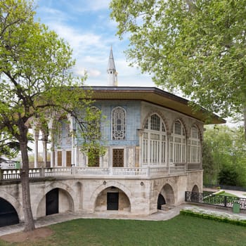 Exterior shot of Baghdad Kiosk, or Bagdat Kosku, located at the Fourth Courtyard of Topkapi Palace, decorated with floral blue mosaic tiles, Istanbul, Turkey