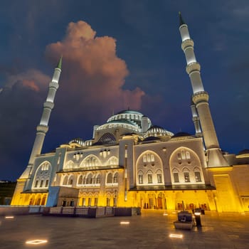 Low angle night shot of Grand Camlia Mosque, or Buyuk Camlica Camii, a modern complex for Islamic worship, built in 2019, located in Camlica hill in Uskudar district, Istanbul, Turkey, in a spring day