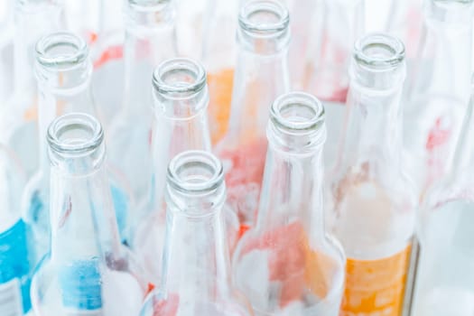 Empty glass bottles for recycling.