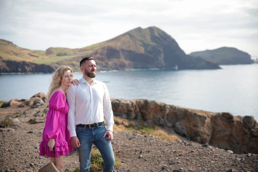 Tourists admiring breathtaking coastal landscape at ponta de s o louren o, madeira