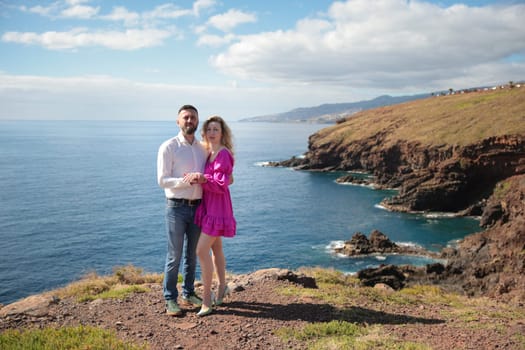 Tourists enjoying breathtaking ocean view from ponta de s o louren o in madeira island, portugal