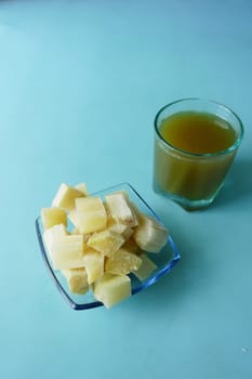 Sugarcane juice on a table .