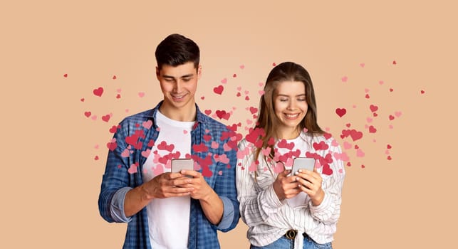 A young couple stands together, engrossed in their smartphones, exchanging affectionate messages. They are surrounded by floating heart symbols, celebrating love on Valentine's Day.