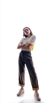 A young woman wearing a trendy outfit confidently poses against a vibrant and bright background, exuding style