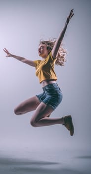 A vibrant dancer is captured midair, showcasing beautiful movement and vivid expression in a dynamic pose