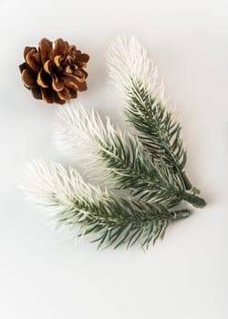 Fake fir tree branch for decorating of bouquets and home.