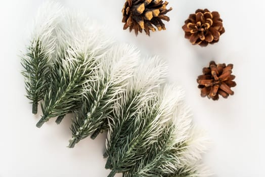 Fake fir tree branch for decorating of bouquets and home.