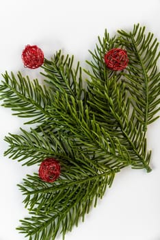 Fake fir tree branch for decorating of bouquets and home.
