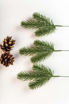 Fake fir tree branch for decorating of bouquets and home.