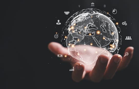 A hand holding a virtual Global Internet connection metaverse, symbolizing fusion of business, technology, and digital marketing. financial and banking sectors, digital link tech and big data.
