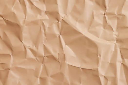 Brown crumpled paper texture. Abstract brown recycled paper background