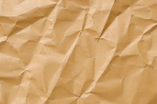 Brown crumpled paper texture. Abstract brown recycled paper background
