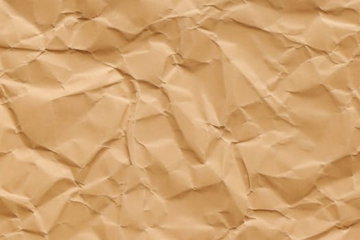 Brown crumpled paper texture. Abstract brown recycled paper background