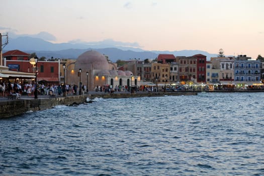 Picturesque old port of Chania. Landmarks of Crete island. Greece. Bay of Chania at sunny summer day, Crete Greece. View of the old port of Chania, Crete, Greece. The port of chania, or Hania.