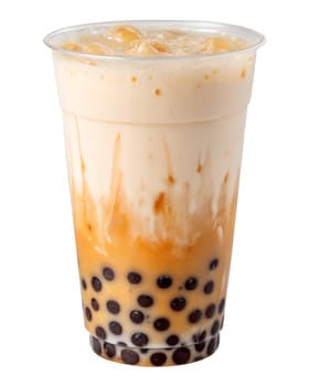 Iced cheese foam bubble tea with chewy tapioca pearls in a plastic cup. Sweet and creamy Asian drink with caramel drizzle. Isolated on white background.