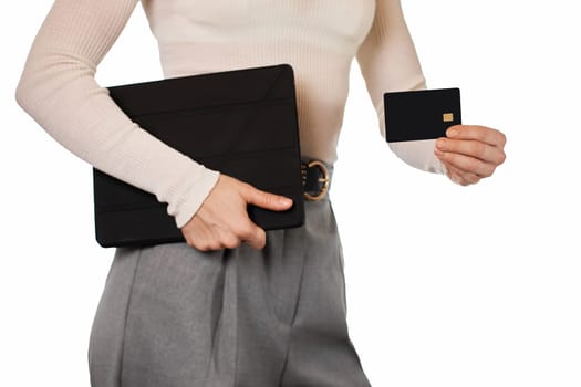 woman in white blouse and grey pants using credit card and digital tablet on white background, mock up