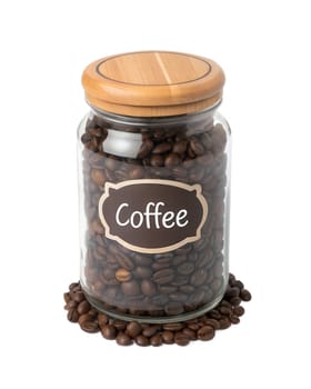 A glass jar filled with roasted coffee beans with a wooden lid and label. Perfect for coffee storage and brewing. Isolated on white background.