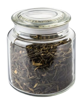 Dried oolong tea leaves stored in a transparent glass jar with a sealed lid. Traditional loose leaf tea for brewing. Isolated on white background