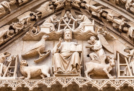 Detailed stone facade of the Cathedral in Burgos, Spain, with its gothic artwork.