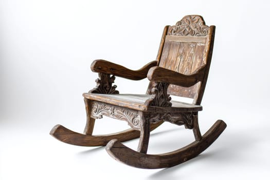 A beautifully crafted wooden rocking chair featuring detailed carvings is showcased in a well-lit studio, highlighting its craftsmanship.