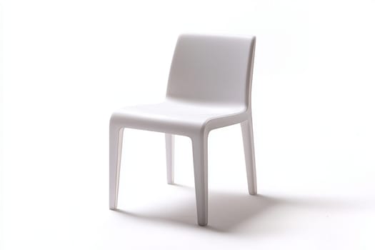 A minimalist white chair sits prominently against a plain light background, emphasizing its sleek lines and simple yet modern design.