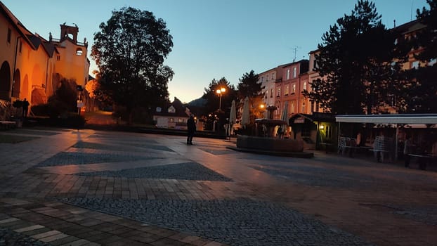 Sunset town square city centre old evening travel landscape nature trees park architecture outdoor. October 16 2024 Decin Czech Republic Europe travel places . High quality photo