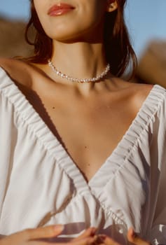 Elegant lady and eye-catching String of pearls . E-commerce online sales, jewelry photo for social media. High quality photo