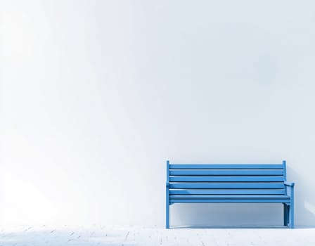 A bright blue bench is positioned against a large white wall in a minimalist space, creating a serene and open atmosphere.