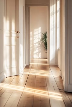 Warm sunlight streams through an open door, illuminating a serene hallway with wooden floors and a hint of greenery in the background.
