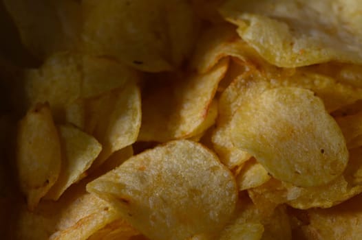 Crunchy snacks fill a bowl, inviting joyful moments during a gathering or movie night with friends.