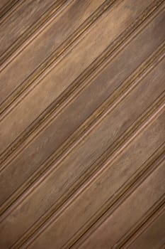 Warm tones of polished wood enhance the inviting atmosphere of a rustic-inspired room filled with character.