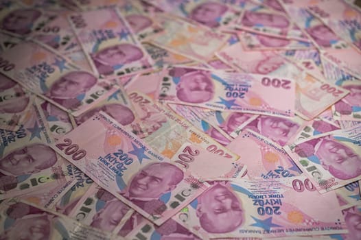 Stacks of bright banknotes are spread out, capturing the essence of financial abundance in a lively display.