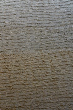 A close-up view of a textured surface exhibits subtle variations, inviting creative exploration and design ideas.