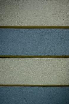 Striking colors and textures blend harmoniously on a contemporary wall, capturing the essence of modern design.