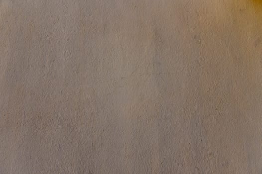 Soft fabric gently illuminated reveals a rich texture with captivating variations enhancing visual warmth and comfort.