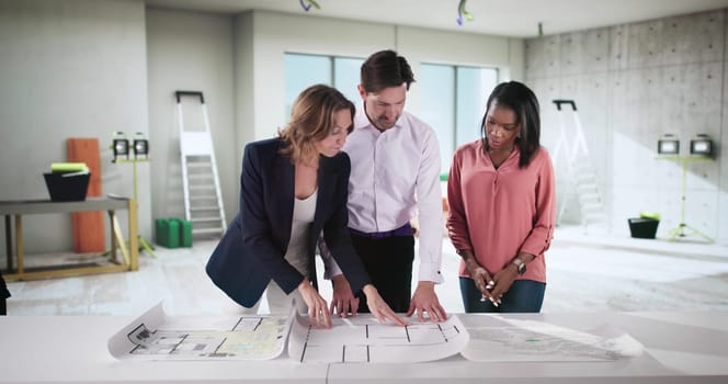 Young Couple Seeking Advice From Realtor in Buying First Home